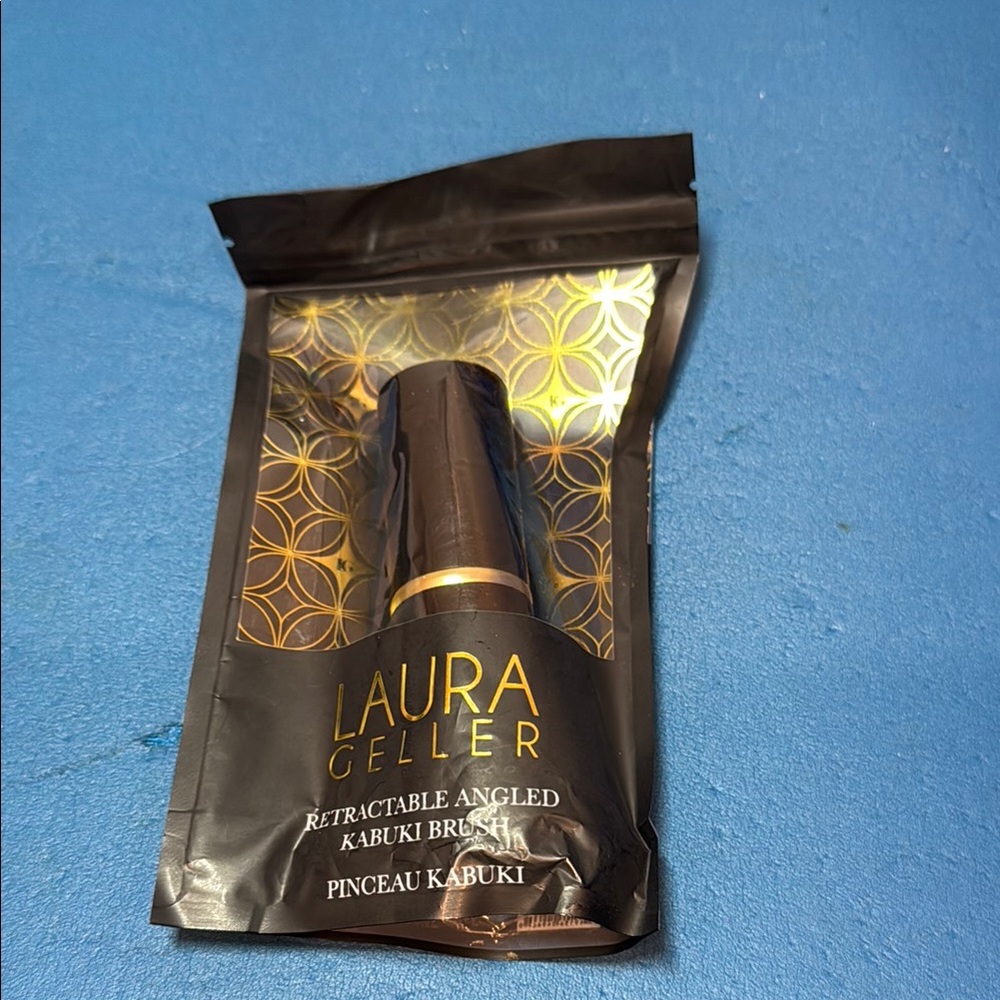 Laura Geller Black and Gold Retractable Kabuki Brush